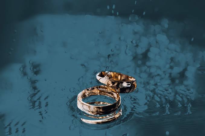 gold ring in water