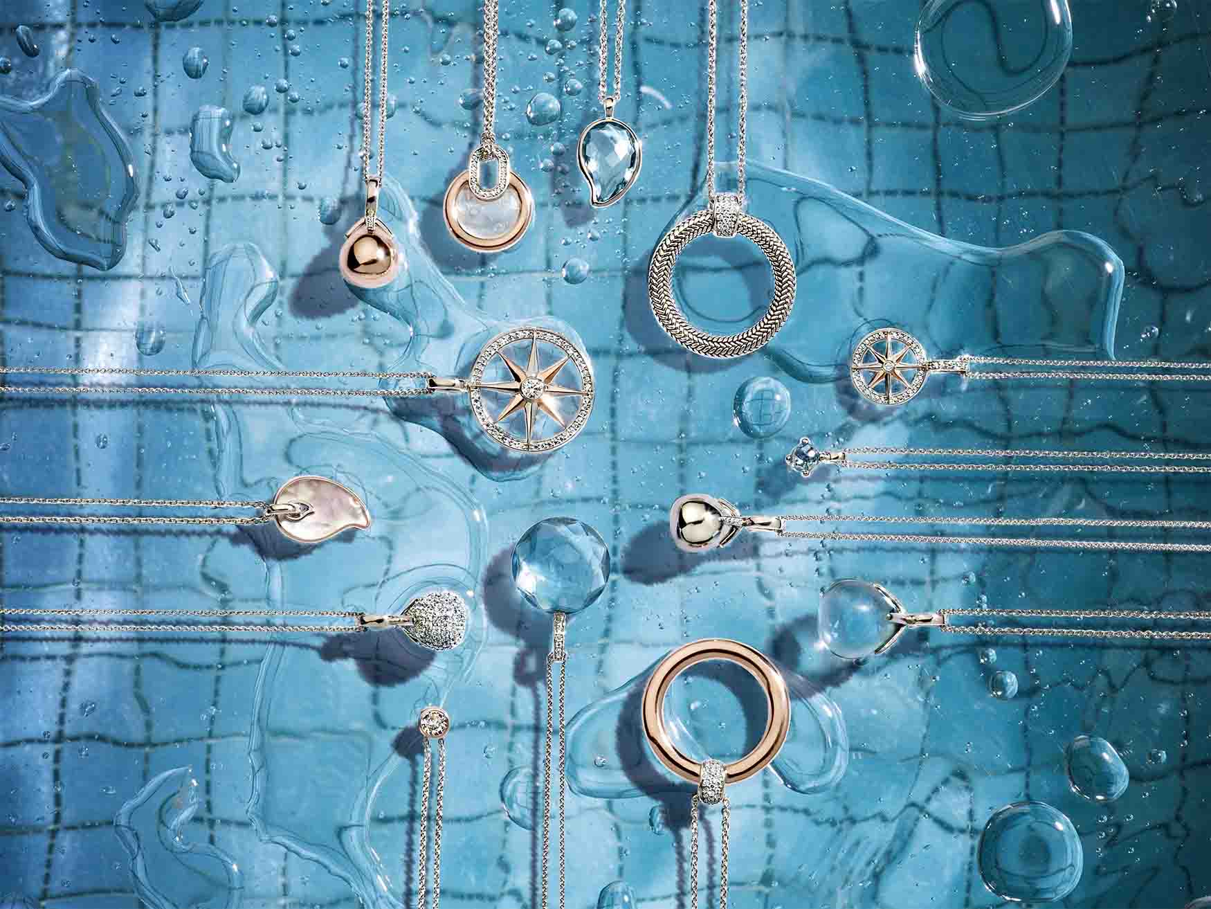 silver jewelry in pool water